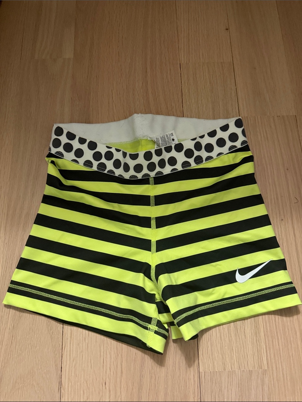 Nike Women's Neon Yellow and Black Striped Athletic Shorts